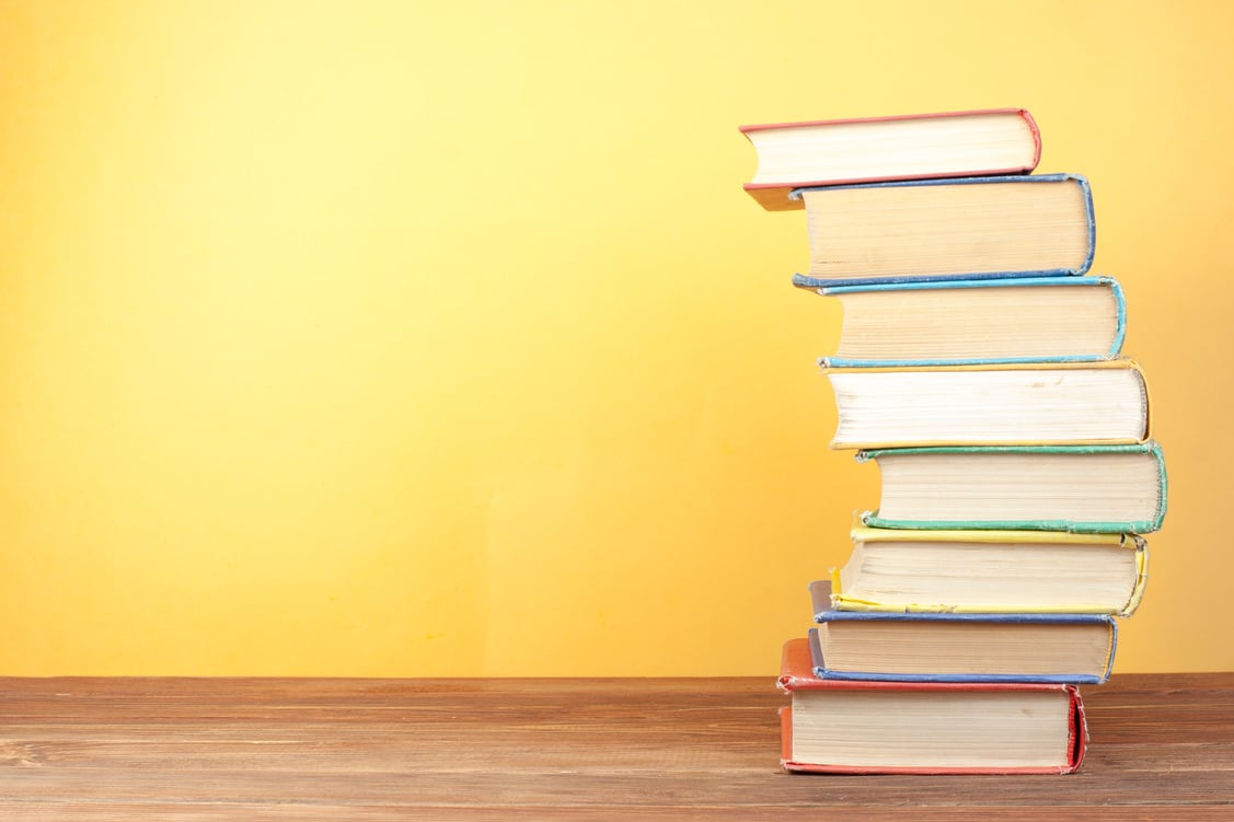 Stack of colorful books. Education background. Back to school. Copy